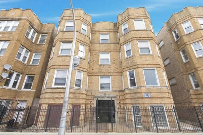 Building Photo - 1123 N Christiana Ave Unit 2S