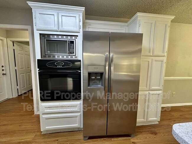 Building Photo - 7724 Sagebrush Ct N