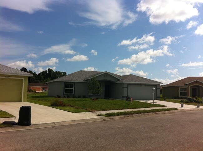 Photo - Well maintained 3/2/2 with pond view and community pool