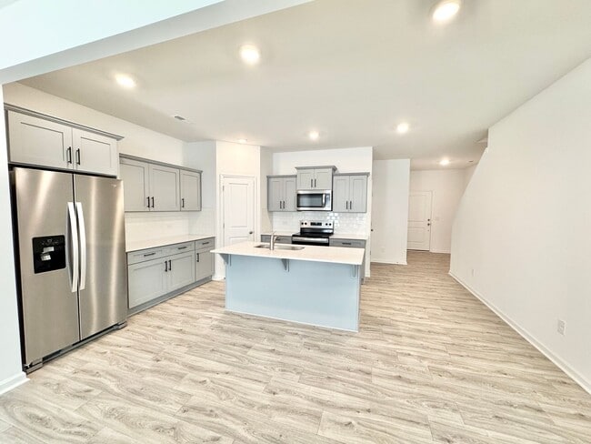 Photo - 3 br 2.5 ba townhome AVAILABLE JULY 16TH close to freeways and shopping!