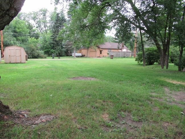 Photo - 3 bedroom, 1 bath. Large yard with large storage shed.