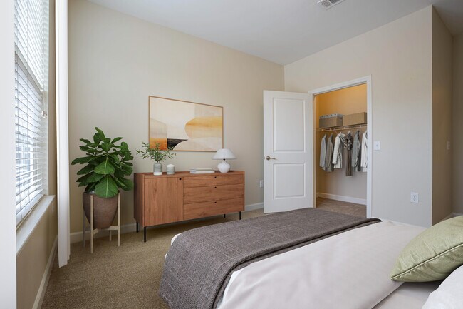 Bedroom with closet space - Heritage Grand at Sienna Apartments