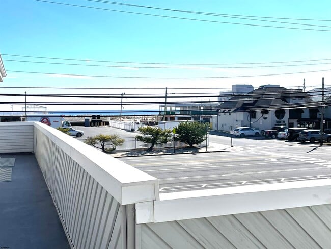 Building Photo - 9105 Atlantic Ave Unit 41