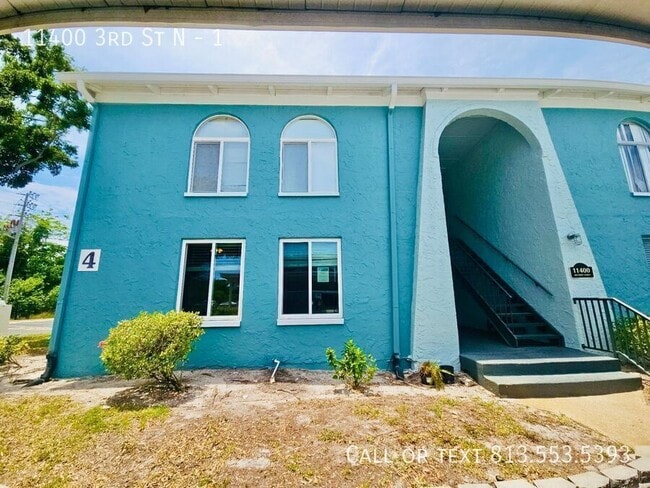 Building Photo - 11400 3rd St N Unit 1