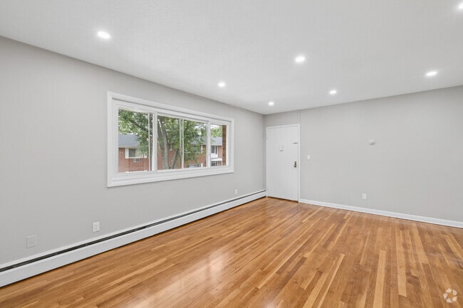 2BR, 1BA - Living Room - Wickham Gardens Condominiums