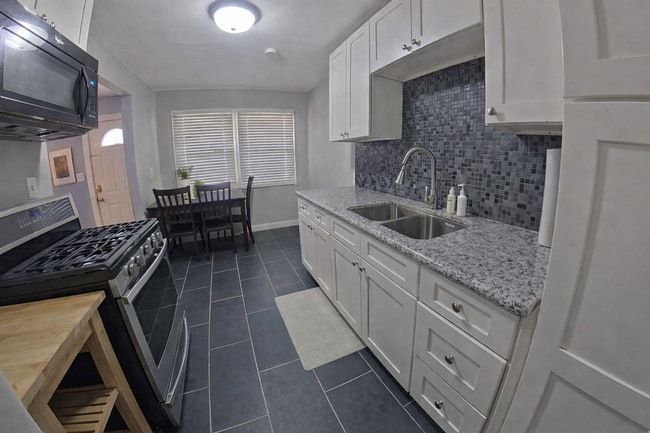 Photo - Close to Shopping Center + Granite Countertops + Shared Off-Street Parking! Available August 5th!