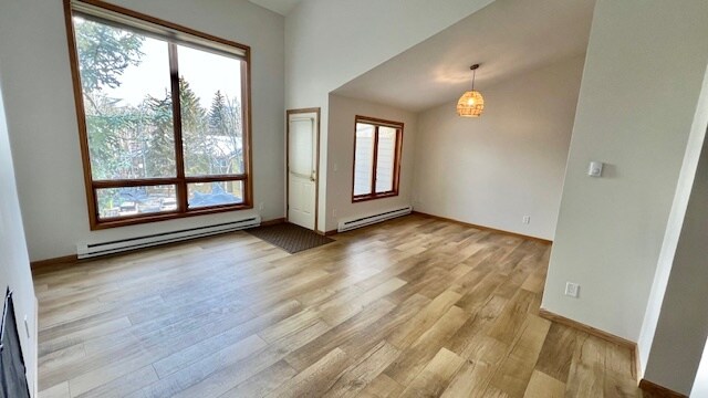 Vaulted living room and dining room ceilings - 640 Homestead Dr