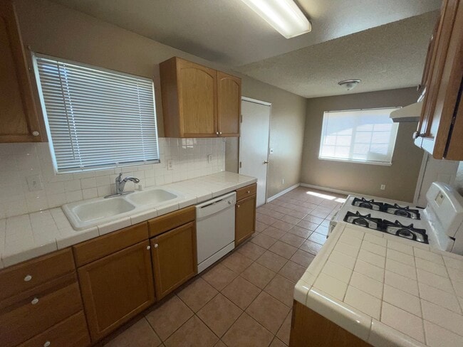 Photo - Move-In Ready 3-Bedroom Home with Backyard Living