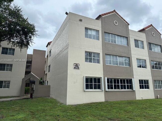 Building Photo - 6175 NW 186th St Unit 110