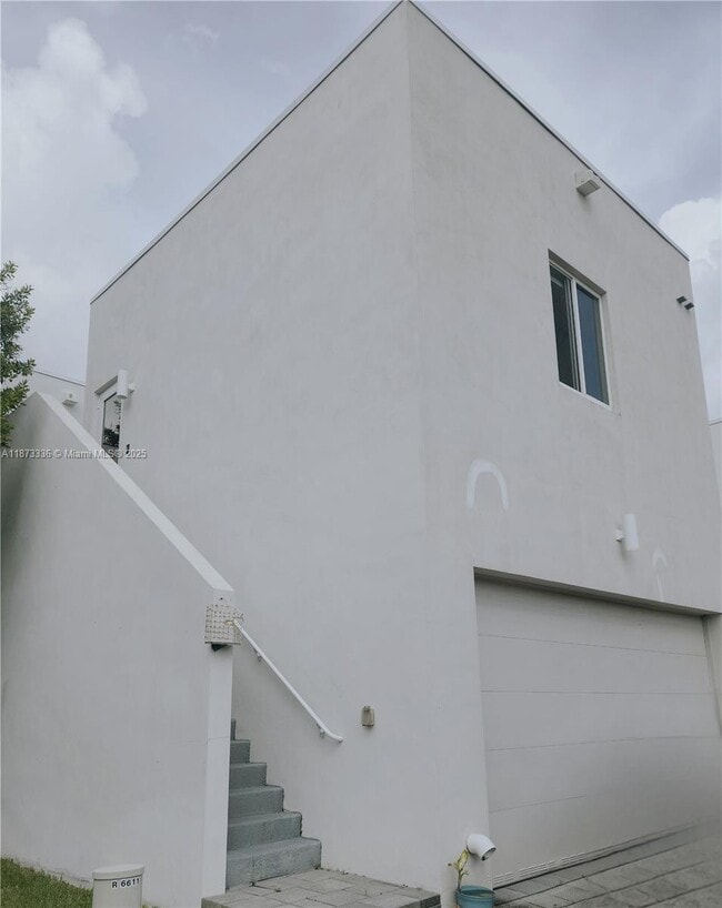 Building Photo - 6611 NW 102nd Path Unit NextGen Rental