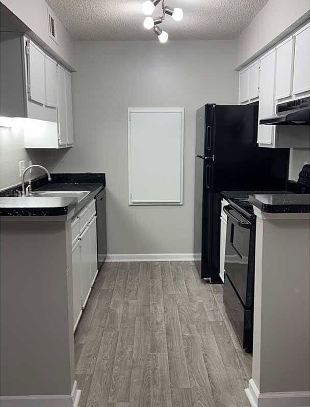 Elevate your lifestyle at Riverwood Park Apartments, where modern design meets comfort. Enjoy sleek cabinetry and upgraded appliances in a spacious kitchen perfect for culinary creations. Schedule your tour today and find your ideal home.