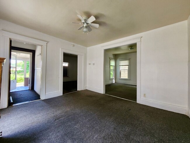 Photo - 5 Bedroom 2 Full Bath Houses | Front Porch | Back Yard | Off Street Parking | in-Unit Laundry