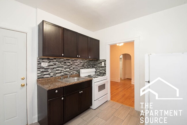 Building Photo - 6347 N Magnolia Ave Unit 2M Rental