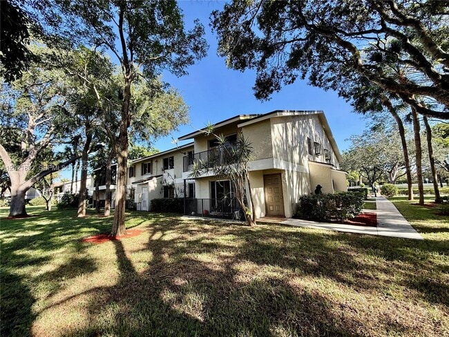 Building Photo - 110 Gardens Dr Unit 203
