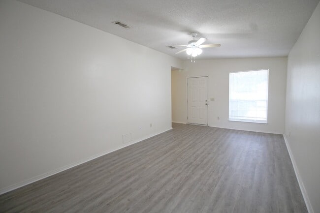 Photo - Well-Maintained 3BR Home in Bay Pine Villa Near NAS Pensacola with Open Layout & Private Backyard