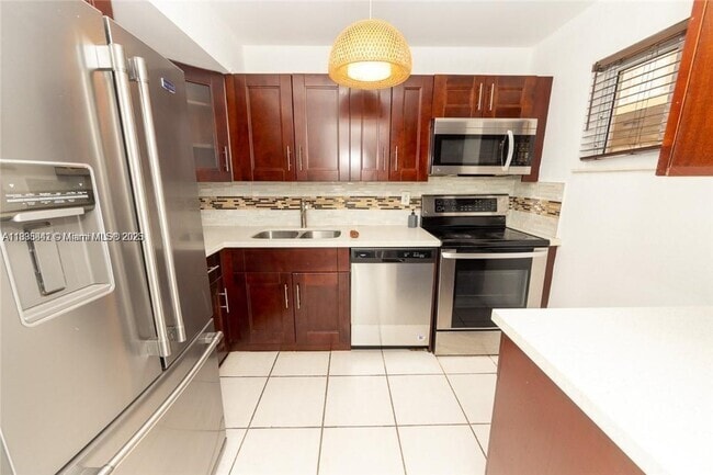 Building Photo - 4235 N University Dr Unit 205 Rental