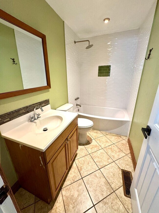 Photo - Charming Bungalow with Large Fenced Backyard, Shed & Great Central Location!