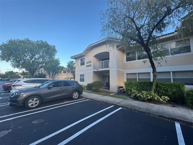 Building Photo - 12141 Royal Palm Blvd Unit 7E