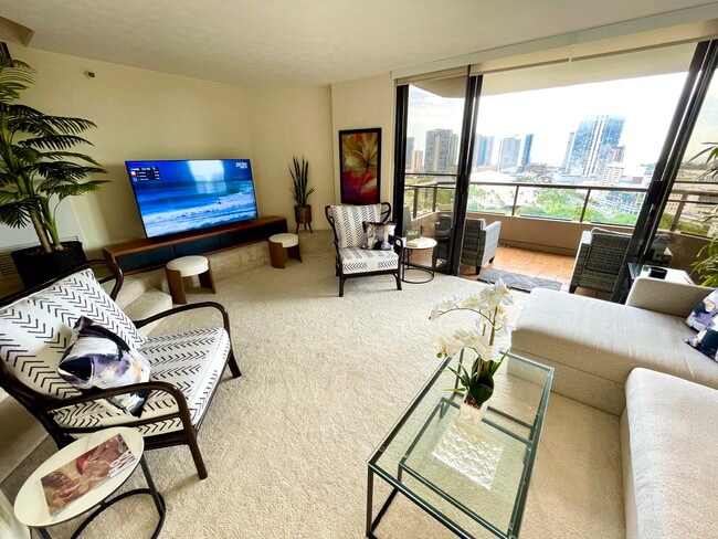 A second view of entertainment area with 65" TV