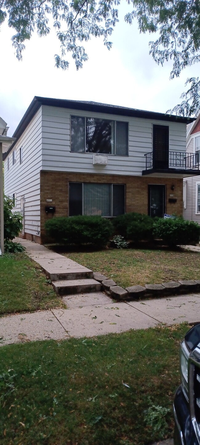 Building Photo - 6011 W Lapham St Unit upper Rental