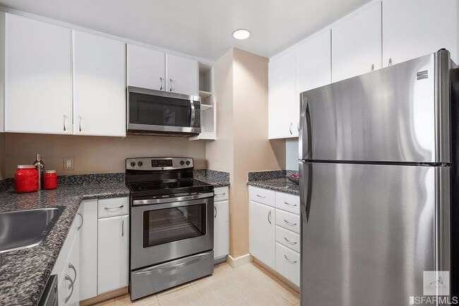 Photo - Spacious One-Bedroom Elegance in a Luxury Doorman Building with EV Parking Unidad 741