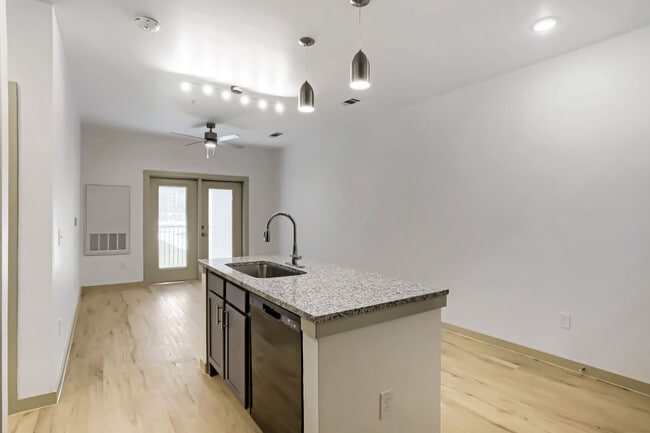 kitchen island and living room - Cleveland Pioneer Crossing
