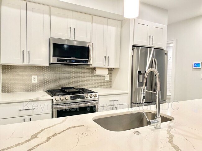 Building Photo - 3463 14th St NW Unit 1