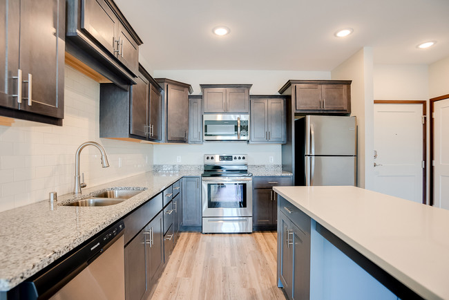 Cocina amplia - Crossroads at Elm Creek Apartamentos