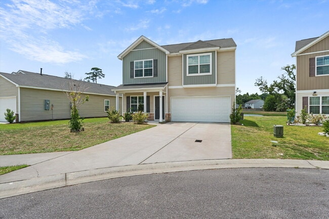 Photo - 4 Bedroom, 2.5 baths, with a 2 car garage located in Shell Point Farm.