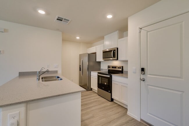 Photo - Gorgeous Townhome with upgrades in gated community* 3 large bedrooms, 2 car garage*Community pool...