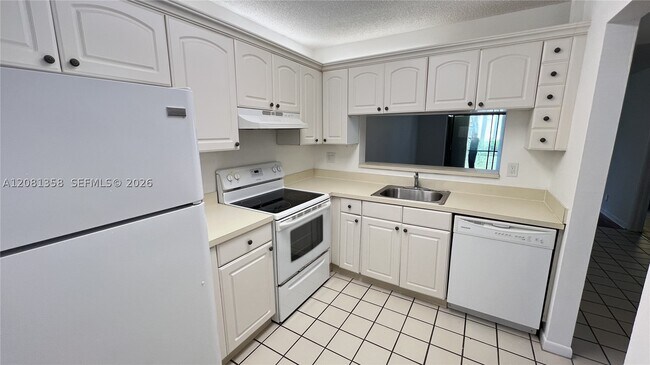 Photo - 1290 S Military Trail Unit 416