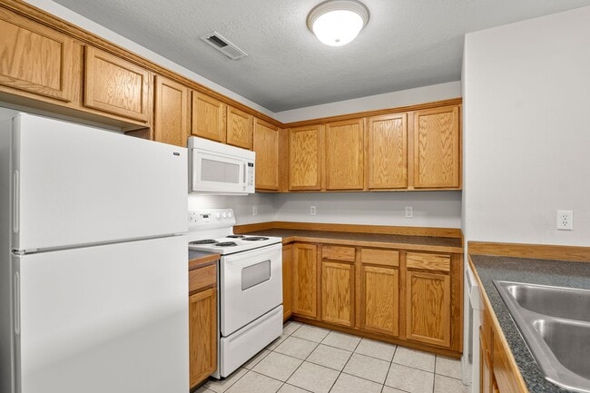 Photo - Upstairs 1-bedroom, 1-bath Apartment in an... Unit 247