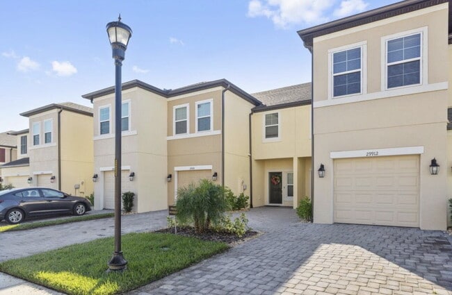 Building Photo - "Charming 3-Bedroom Retreat with Lake View & Pool on Southwell Lane, Wesley Chapel!"