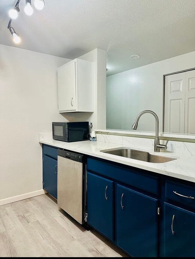 Building Photo - 975 Aberdeen Ave NE Unit E208 Rental