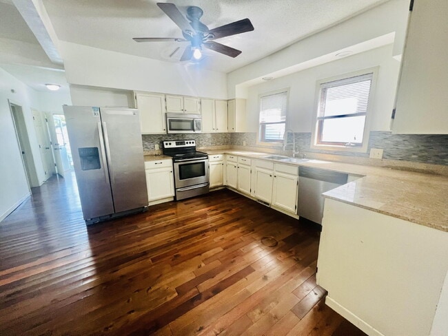 Photo - "Spacious 5-Bedroom Retreat with Elegant Hardwood Floors in Vibrant Minneapolis Neighborhood!"