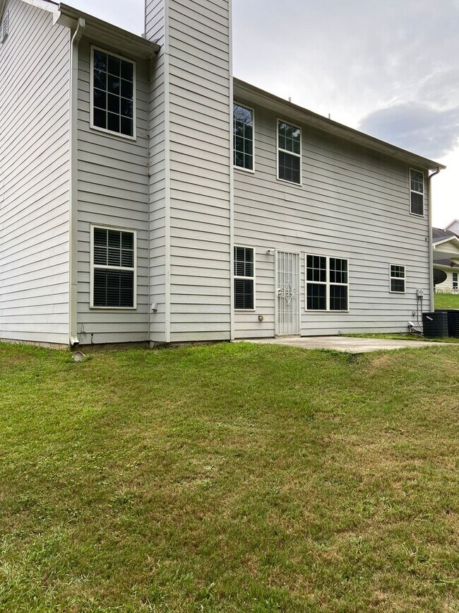 Photo - 4BR Home w/ Fireplace + 2-Car Garage in Snellville