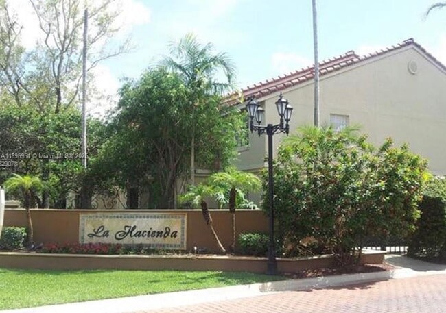 Building Photo - 18342 NW 68th Ave Unit E