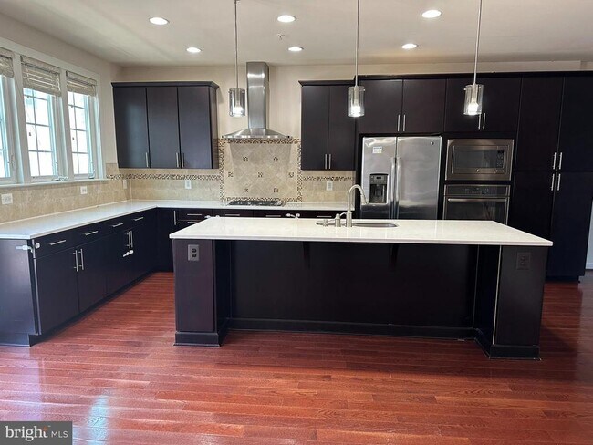 Photo - 13673 Neil Armstrong Ave Townhome