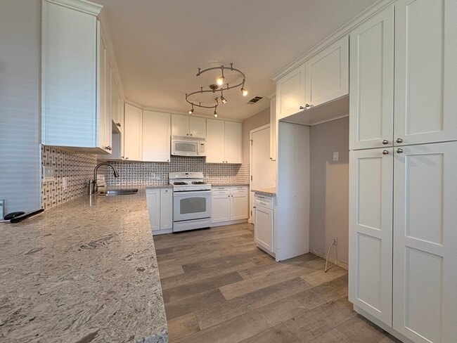 Photo - Beautifully Updated 3/2! Backyard, 2 Car Garage! Modern and Clean!