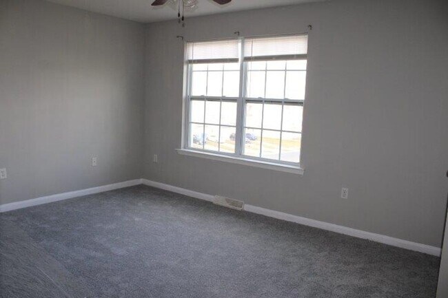 Photo - Modern 3-Story Townhouse Living with Garage