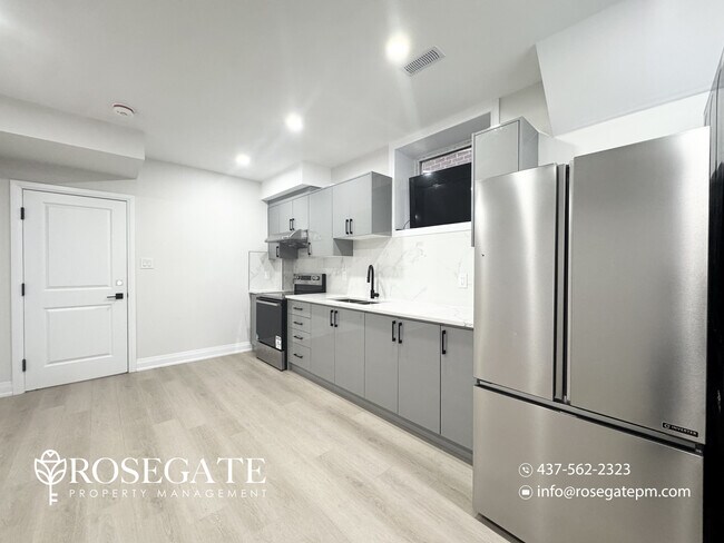 Photo - Bright 2-Bedroom Basement Apartment with P... Unit 2