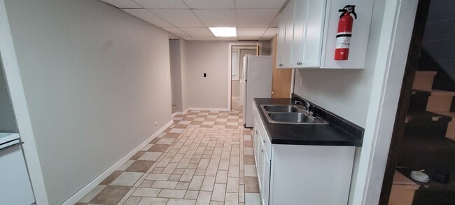 Building Photo - 2403 Calihan Ave NE Unit B