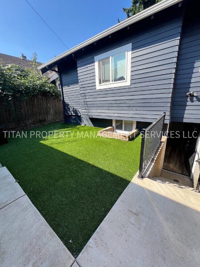 Building Photo - 5764 NE Garfield Ave. Unit #A