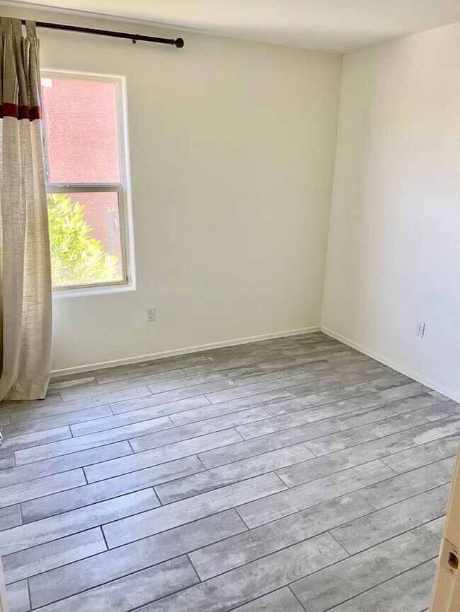 Photo - COMING SOON! New 3BR 2 BA Home w/ 2-Car Garage • Stainless Kitchen • Timer-Irrigated Yard in East...