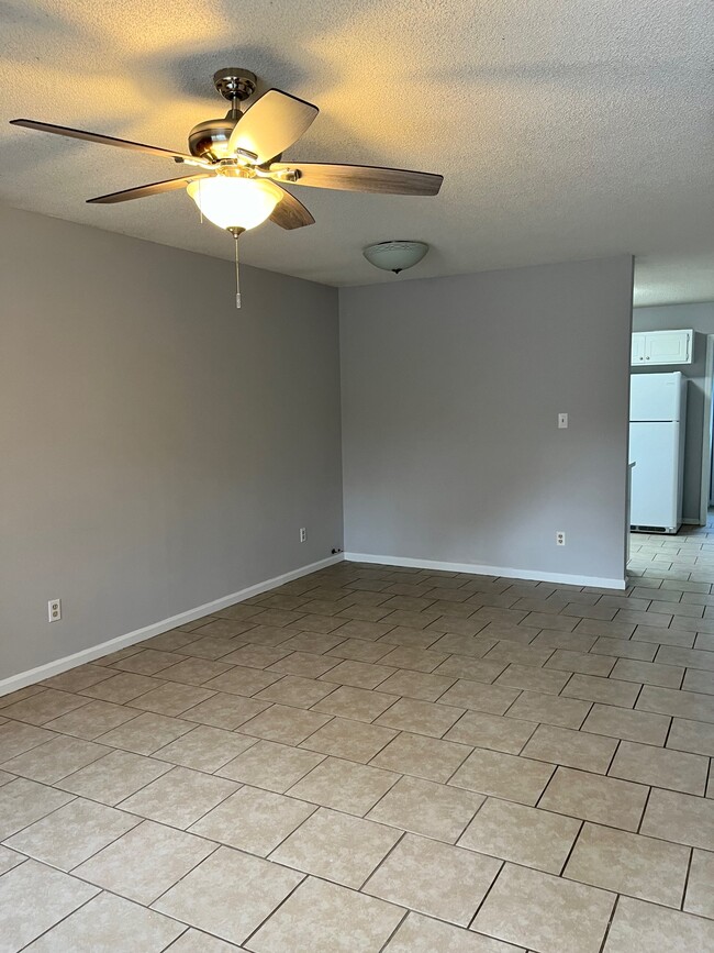 Living and Dining Room from Front Door - 6006 Susan Cir Apartments