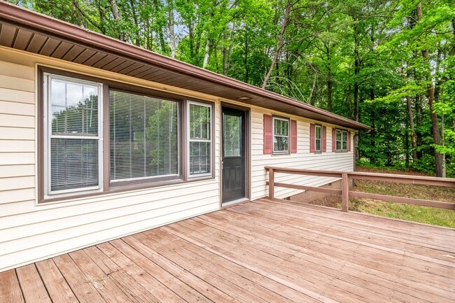 Photo - Updated Home, Stainless Steel Appliances, Wood Like Flooring, Deck, Garage!