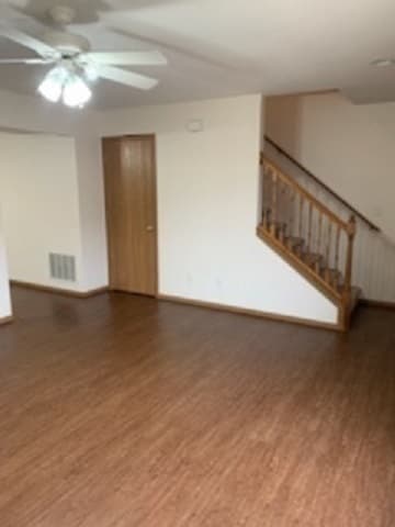 Living room view - storage under the stairs - 405 Franklin St Unidad 2