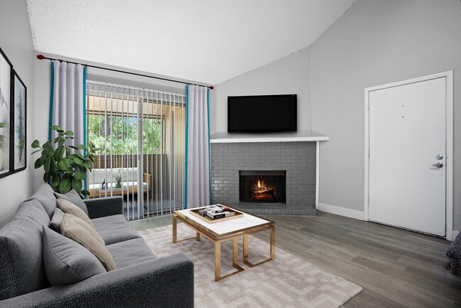 Comfort, warmth, and style come together in the living room by the fire. - Avens Point