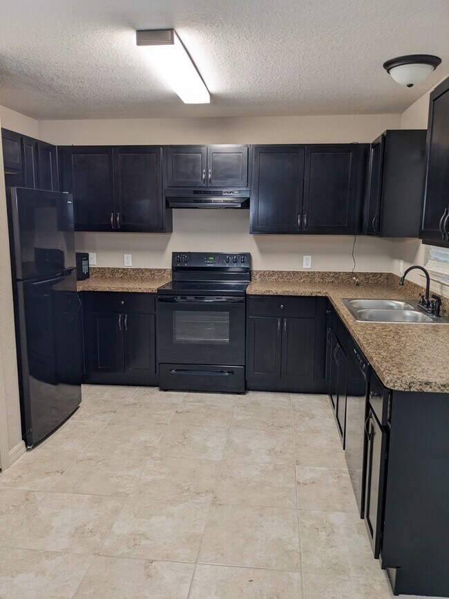 Photo - Almost New 3/2/2 garage