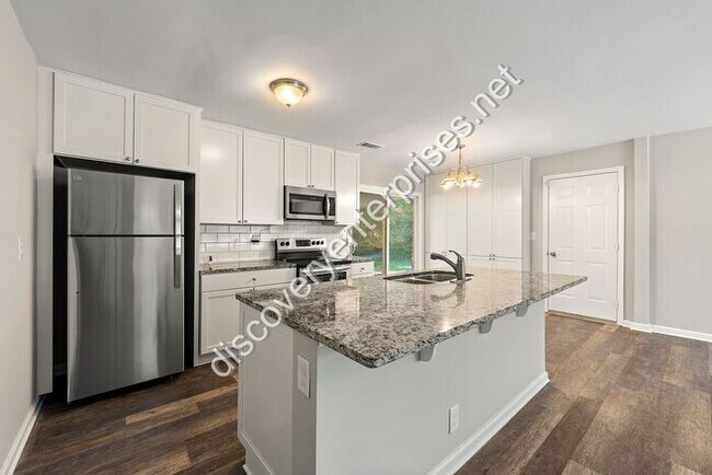 Photo - Renovated 4 bdrm/ 2 bath - Open Floor Plan...